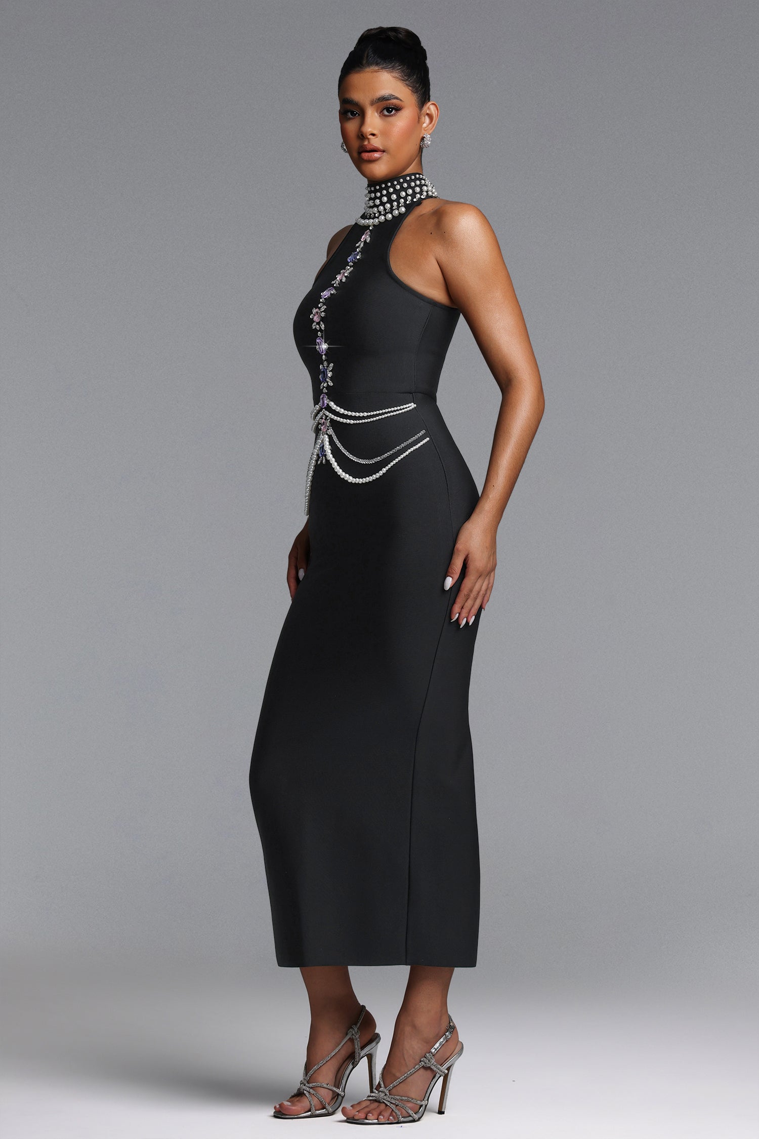 MAXI HALTER'S BLACK DRESS WITH CRYSTALS AND PEARL DECORATIONS