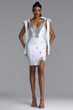 WHITE MINI DRESS WITH CORKS, CRYSTALS AND A DECIMAL V