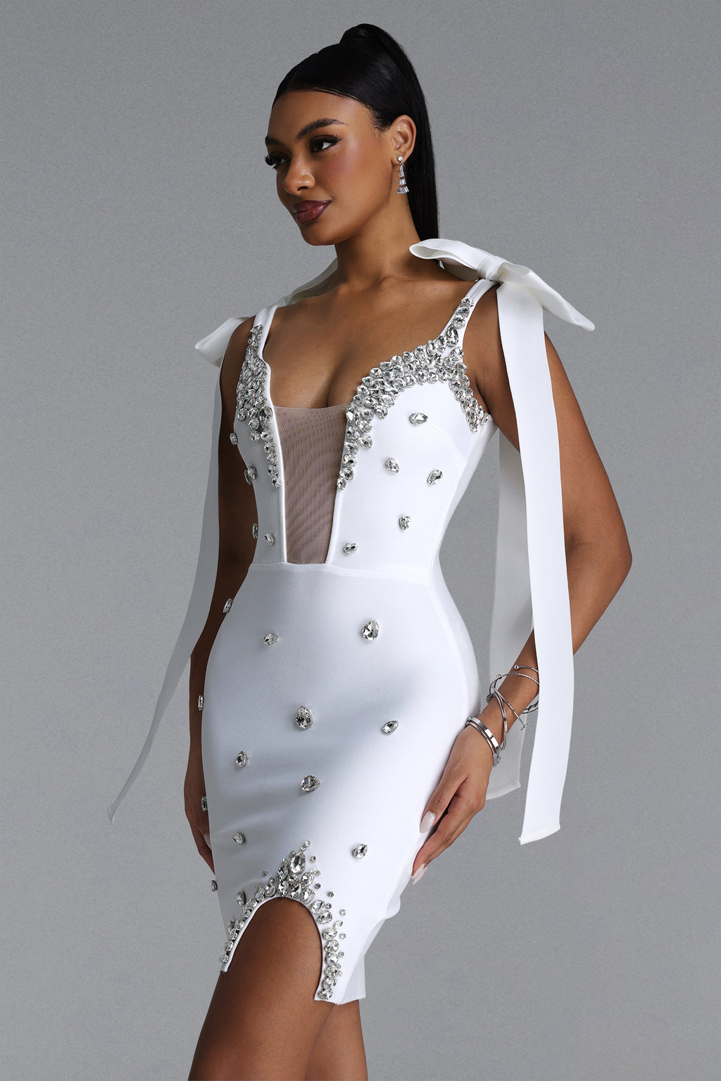 WHITE MINI DRESS WITH CORKS, CRYSTALS AND A DECIMAL V