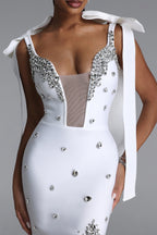 WHITE MINI DRESS WITH CORKS, CRYSTALS AND A DECIMAL V