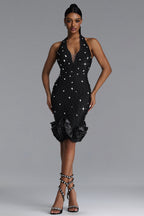 BLACK MIDI DRESS WITH CRYSTALS, DEEP DOCK AND A DECORATIVE BOTTOM
