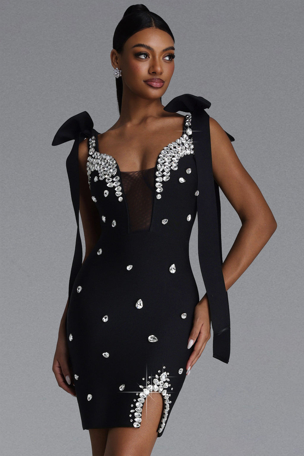 BLACK MINI DRESS WITH CORDS, CRYSTALS AND A DECIMAL V