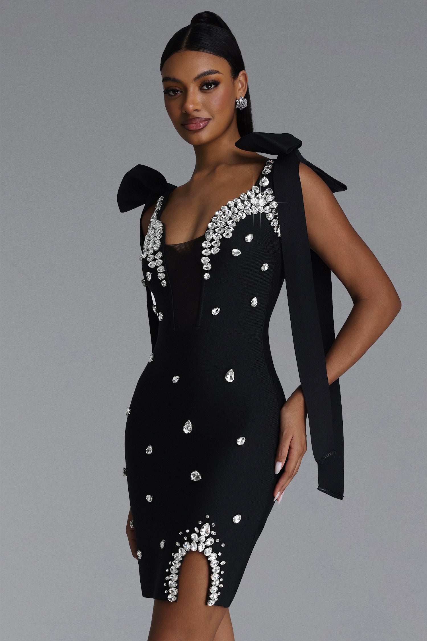 BLACK MINI DRESS WITH CORDS, CRYSTALS AND A DECIMAL V