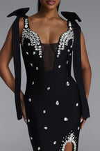 BLACK MINI DRESS WITH CORDS, CRYSTALS AND A DECIMAL V