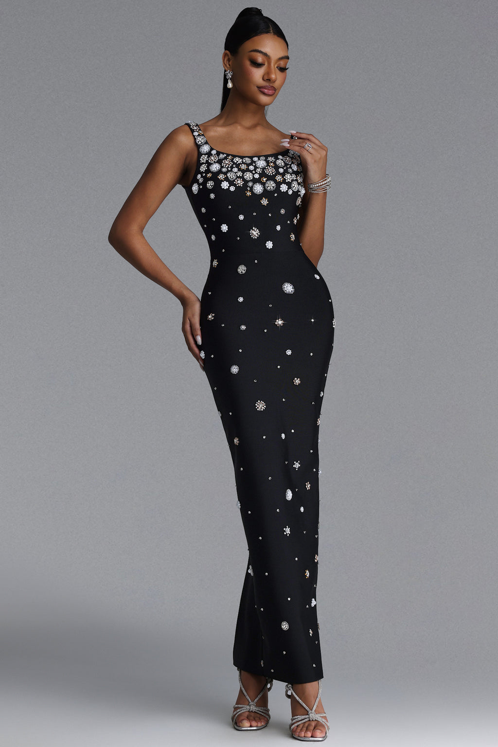 MAXI BLACK DRESS WITH CRYSTAL DECORATIONS AND JEWELRY STRAPS