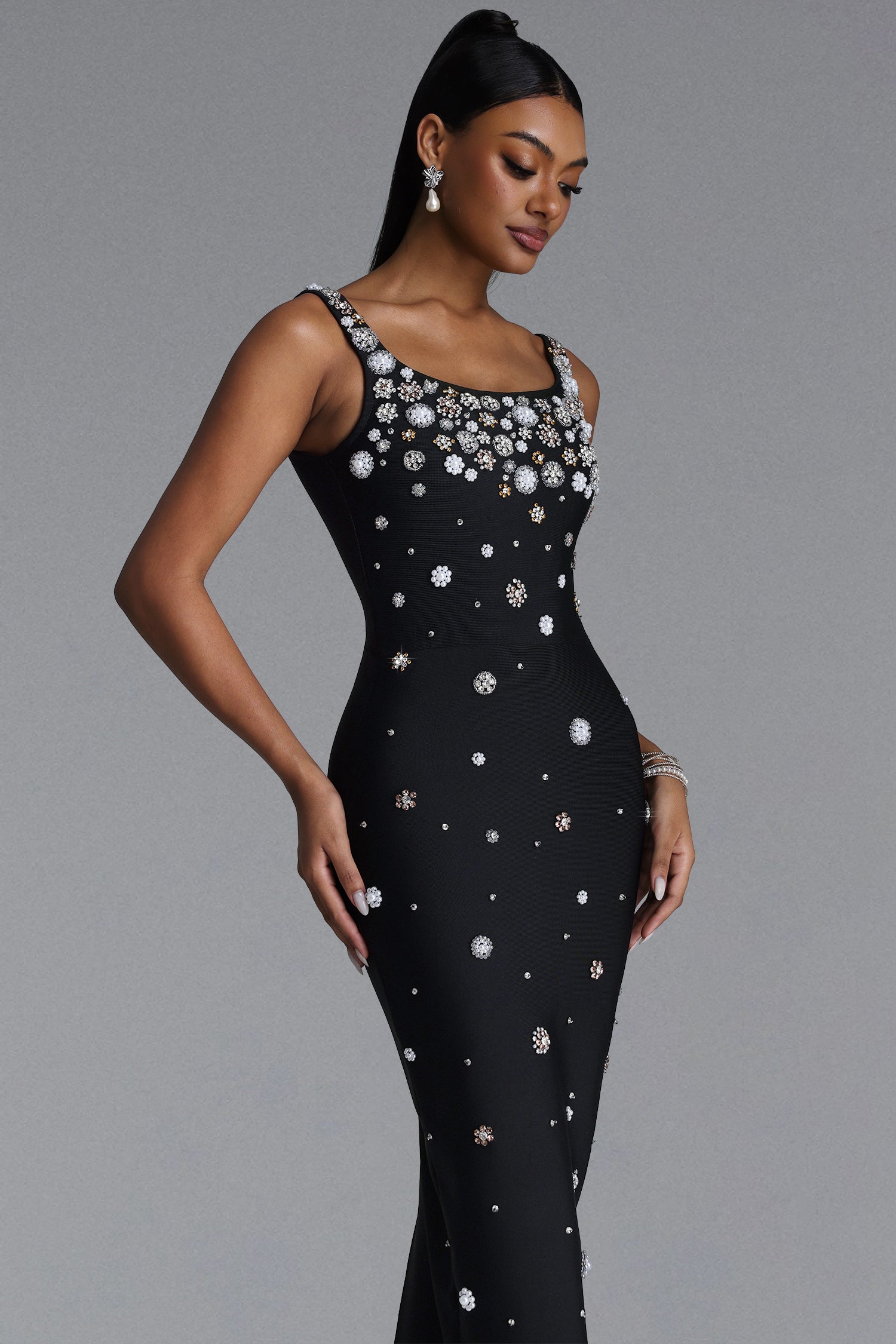 MAXI BLACK DRESS WITH CRYSTAL DECORATIONS AND JEWELRY STRAPS