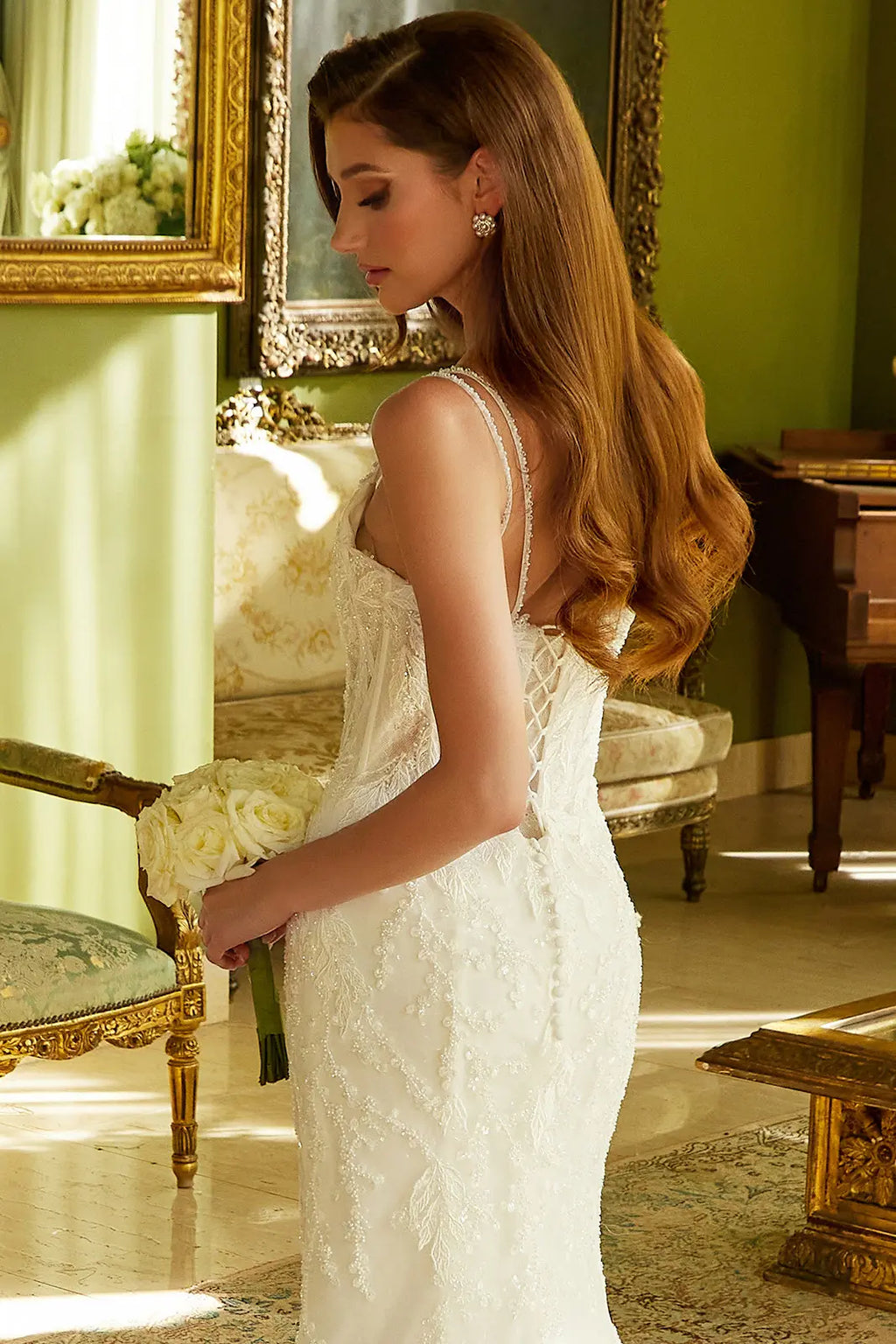 Fitted Wedding Dress A Double Spaghetti-Strap, V-Neckline Corset Bodice.