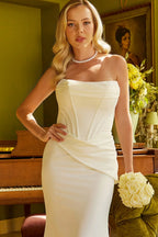 Fitted wedding dress, corset bodice is strapless, has a boat neckline