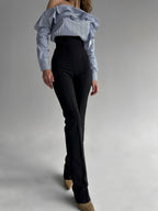 Side view of one-shoulder long sleeve top in blue and white stripe — sizes XXS to M