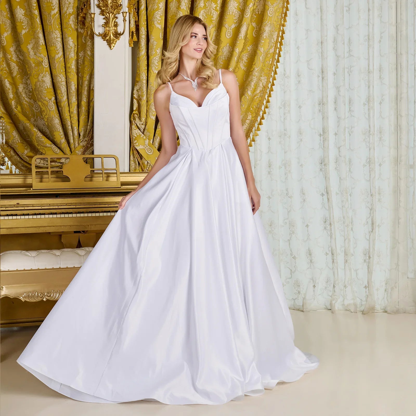 A-line, satin wedding gown spaghetti straps V-neckline