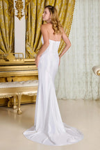 Strapless wedding dress with a boat neckline and a corset-style bodice at the waist.